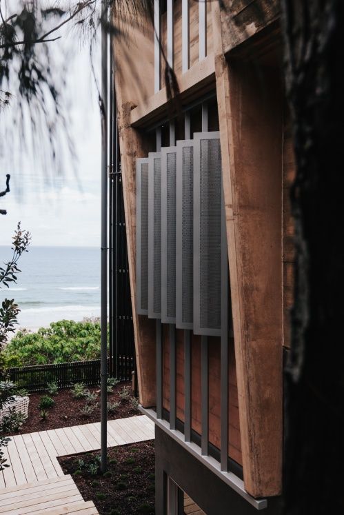 A Close Up of a Building With a View of the Ocean — Architectural Glass Solutions QLD in Cooroy, QLD