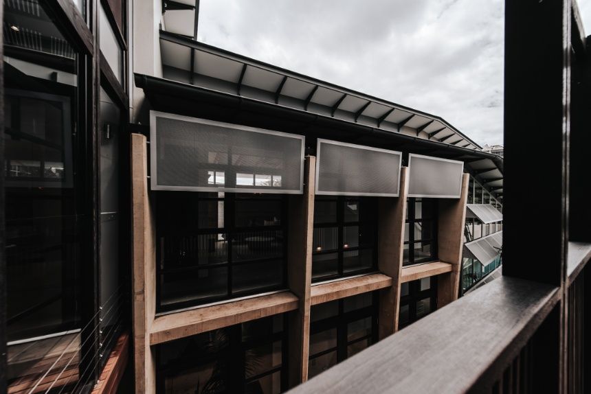 A Building With a Lot of Windows and a Balcony — Architectural Glass Solutions QLD in Cooroy, QLD