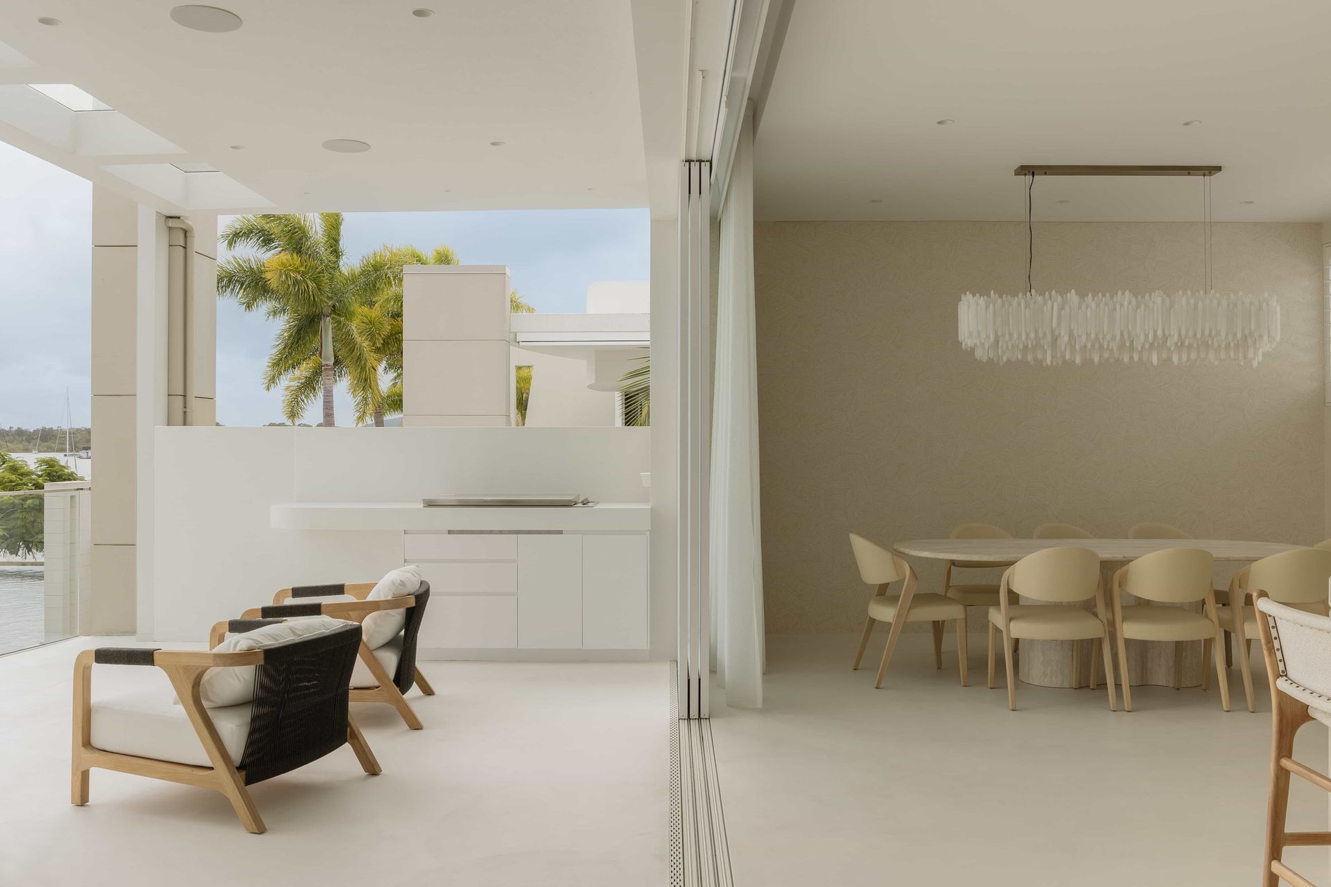 A Living Room With a Table and Chairs and a Dining Room — Architectural Glass Solutions QLD in Cooroy, QLD