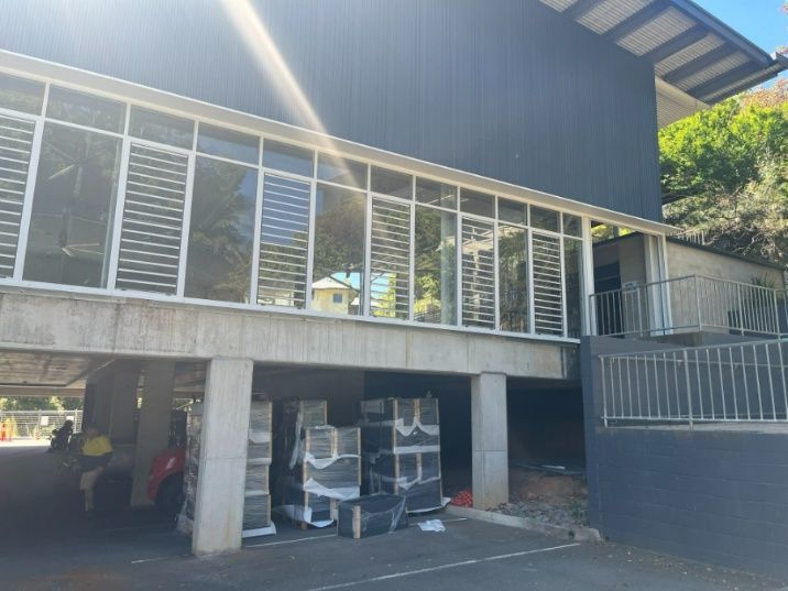 A Building With a Lot of Windows and a Balcony — Architectural Glass Solutions QLD in Cooroy, QLD