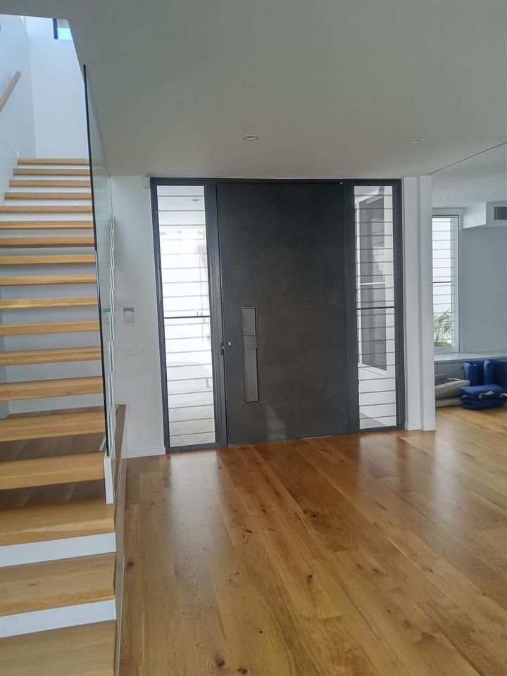 Interior With Wooden Floors, Stairs on Left & Front Door With Sidelights — Architectural Glass Solutions QLD in Cooroy, QLD