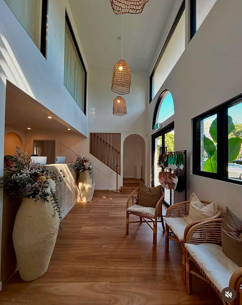 Lobby With High Ceilings, Wooden Floors & Light Walls — Architectural Glass Solutions QLD in Cooroy, QLD