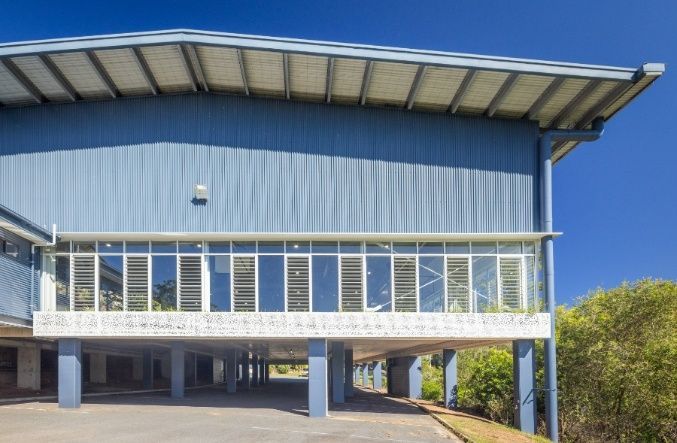 A Large Building With a Lot of Windows and a Balcony — Architectural Glass Solutions QLD in Cooroy, QLD