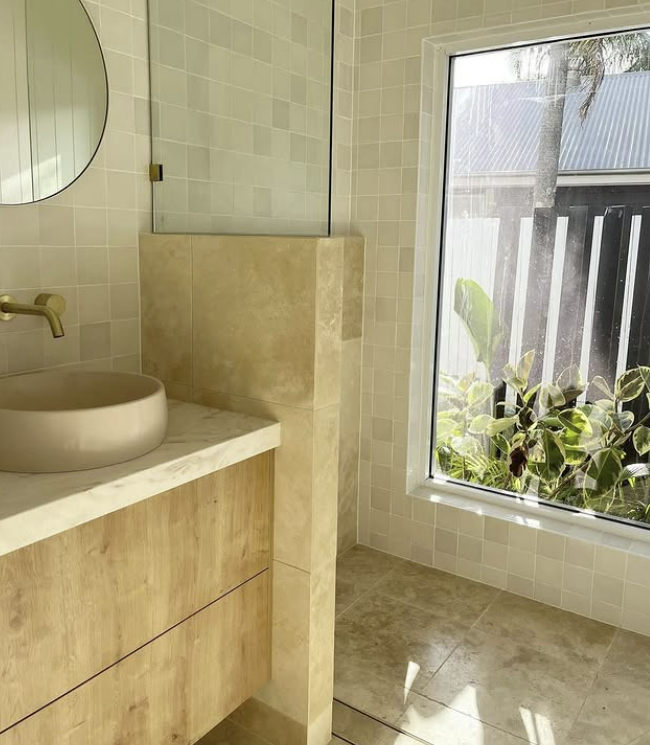 Bathroom With Beige Tiling and Vanity — Architectural Glass Solutions QLD in Cooroy, QLD