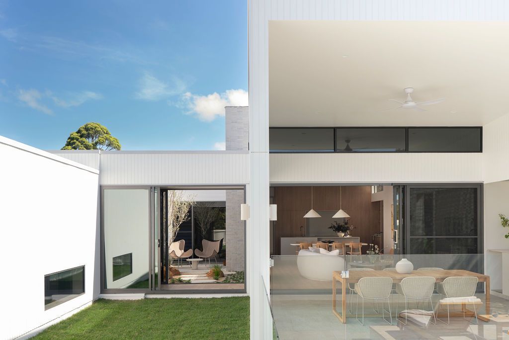 Exterior of modern house with glass sliding doors — Architectural Glass Solutions QLD in Cooroy, QLD
