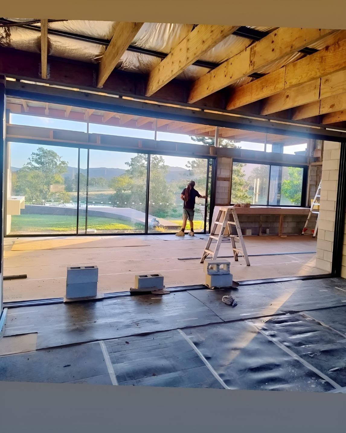 Construction of a House Interior With Large Glass Windows — Architectural Glass Solutions QLD in Cooroy, QLD