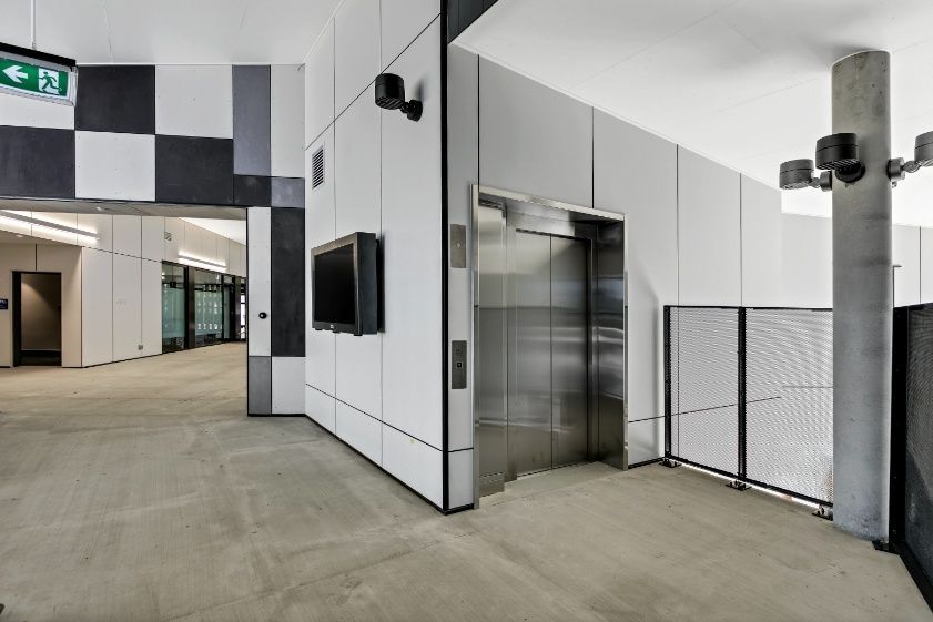 There is an Elevator in the Middle of the Room  — Architectural Glass Solutions QLD in Cooroy, QLD 