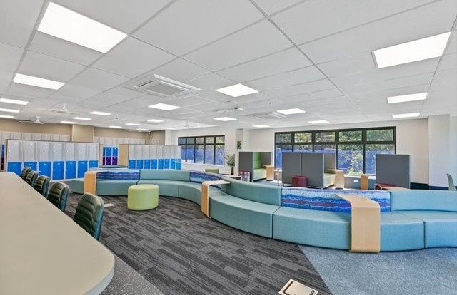 A Large Room With a Lot of Furniture and Lockers — Architectural Glass Solutions QLD in Cooroy, QLD