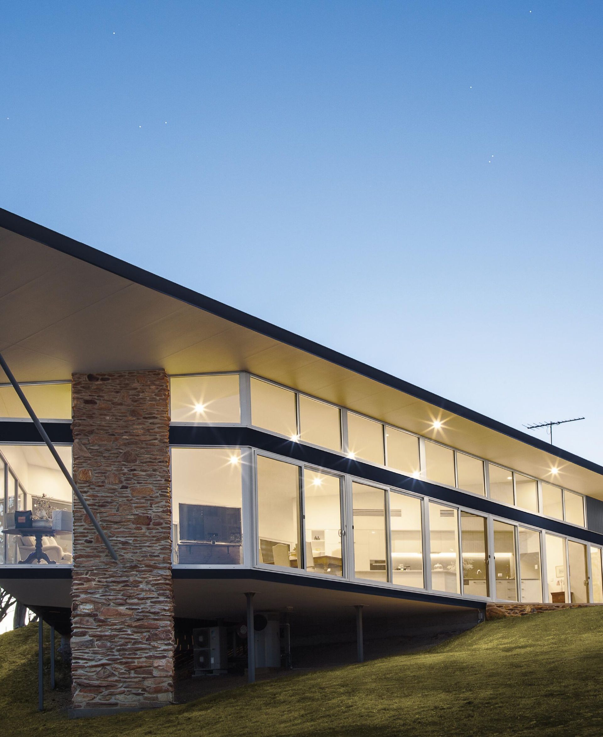 A Building with A Lot of Windows and Balconies — Architectural Glass Solutions QLD in Cooroy, QLD