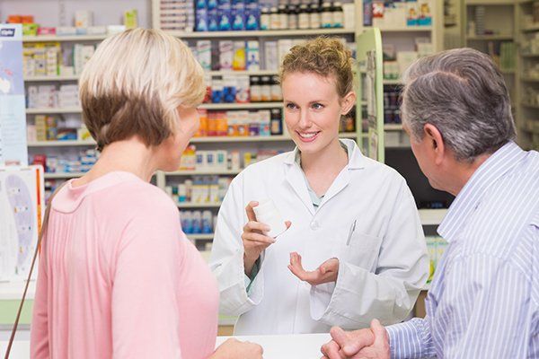 Pharmacist Assisting Customers — New York City — Enexia Pharmacy
