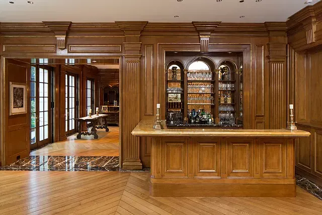 There is a bar in the middle of the room.