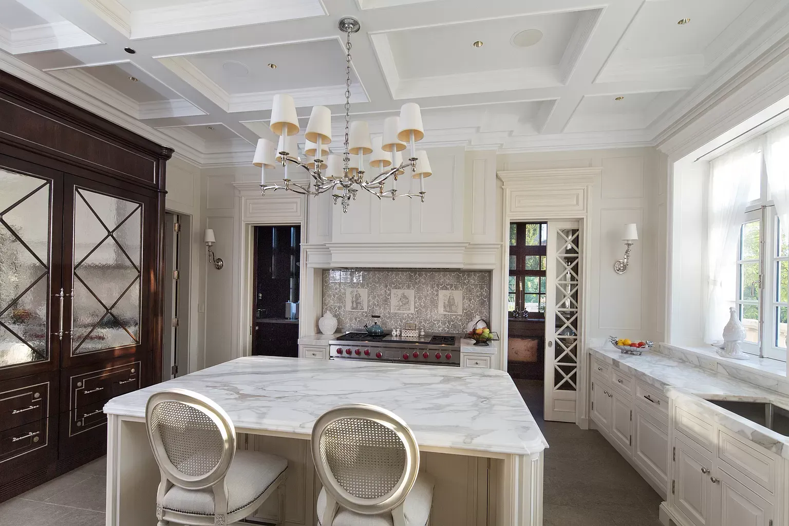 There is a large island in the middle of the kitchen.