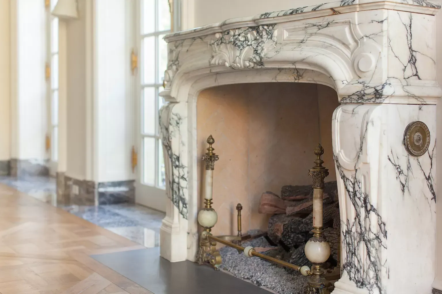 There is a fireplace in the middle of the room.