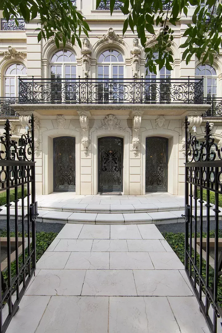 There is a walkway leading to the front of a building.