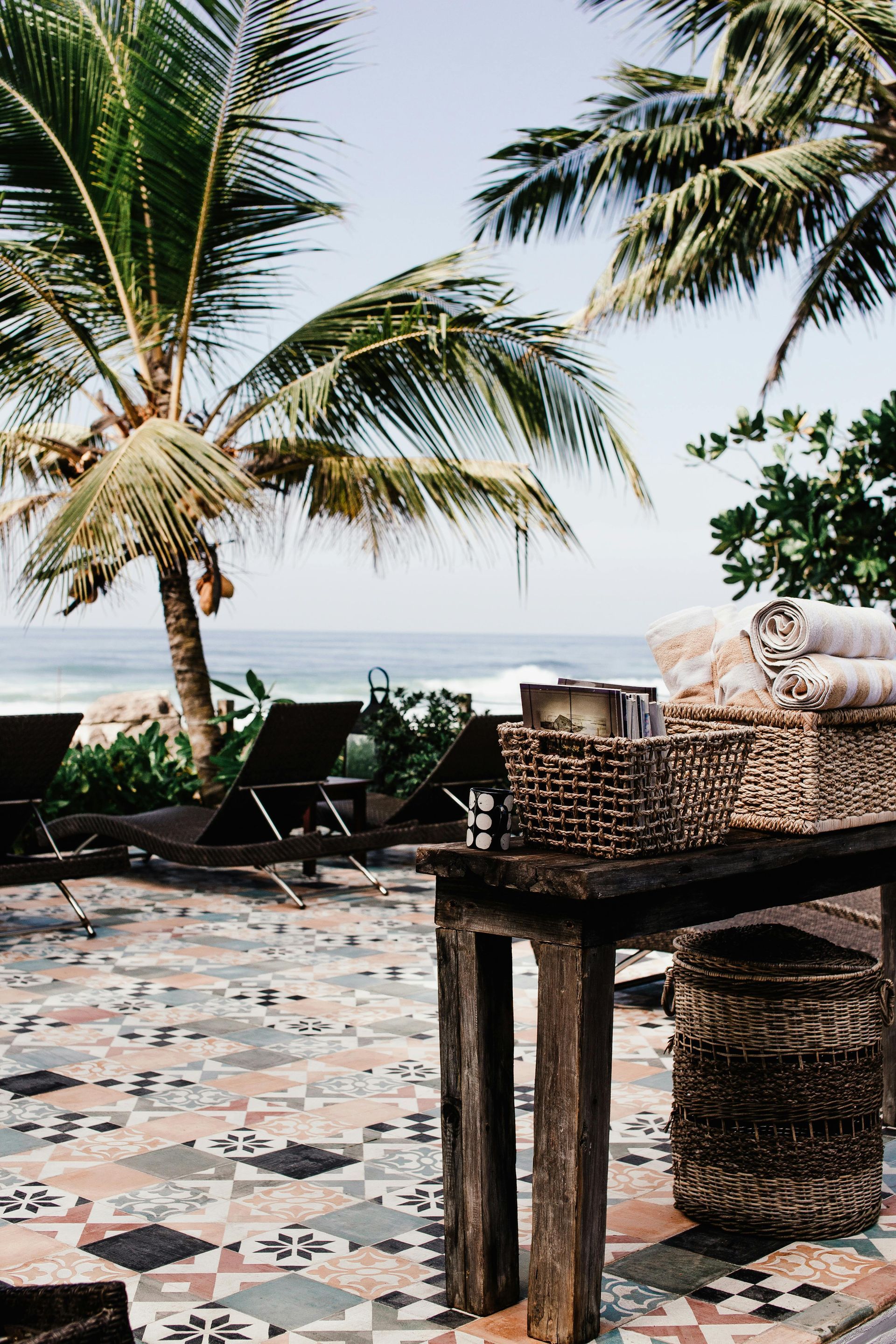 An aerial view of a large body of water surrounded by trees and houses.