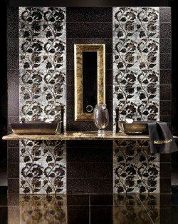 A bathroom with two sinks and a mirror on the wall