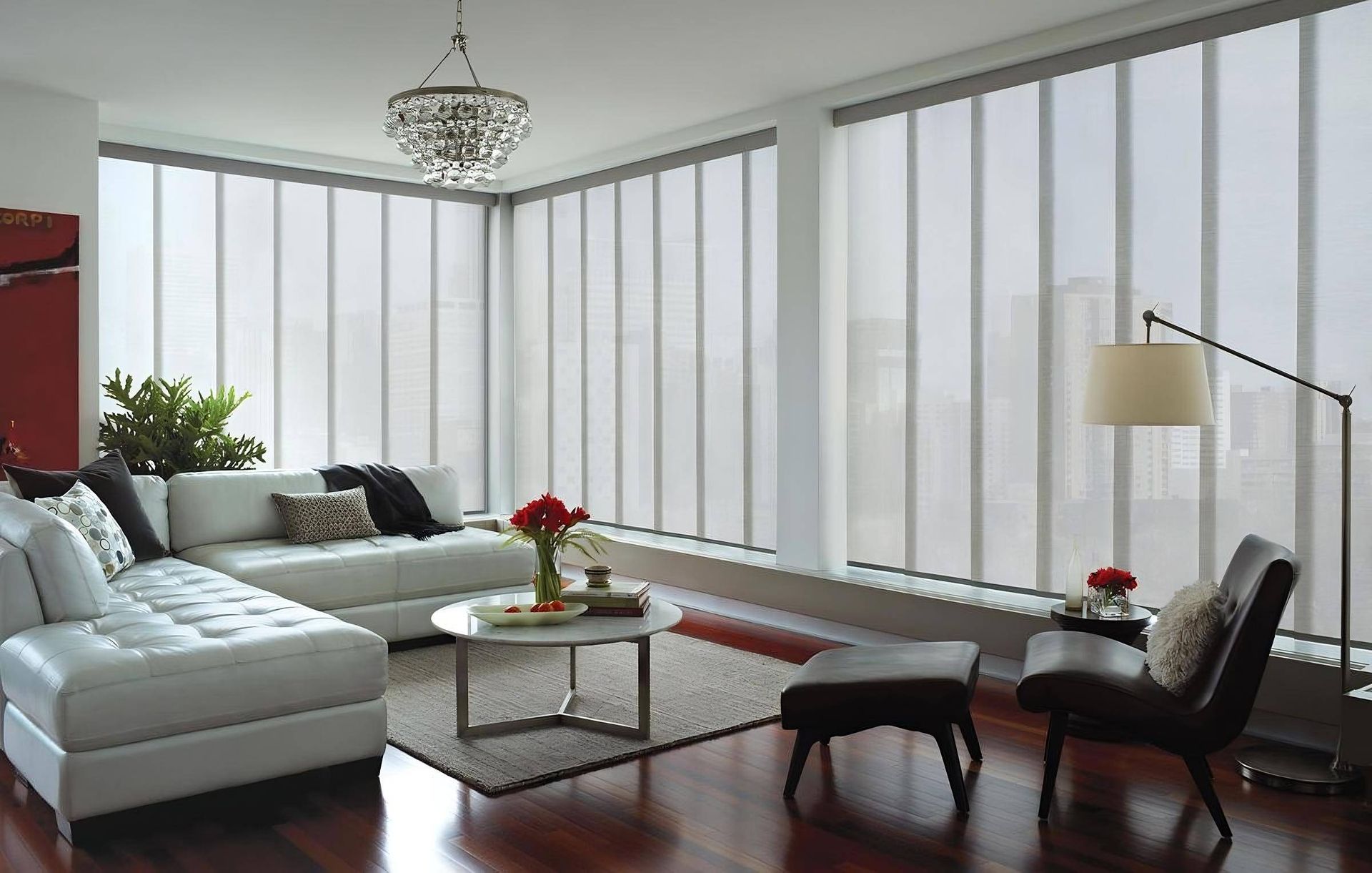 Living room with windows decorated with Hunter Douglas Skyline® Gliding Window Panels at Custom Wood Shutters and Blinds near Tustin, CA