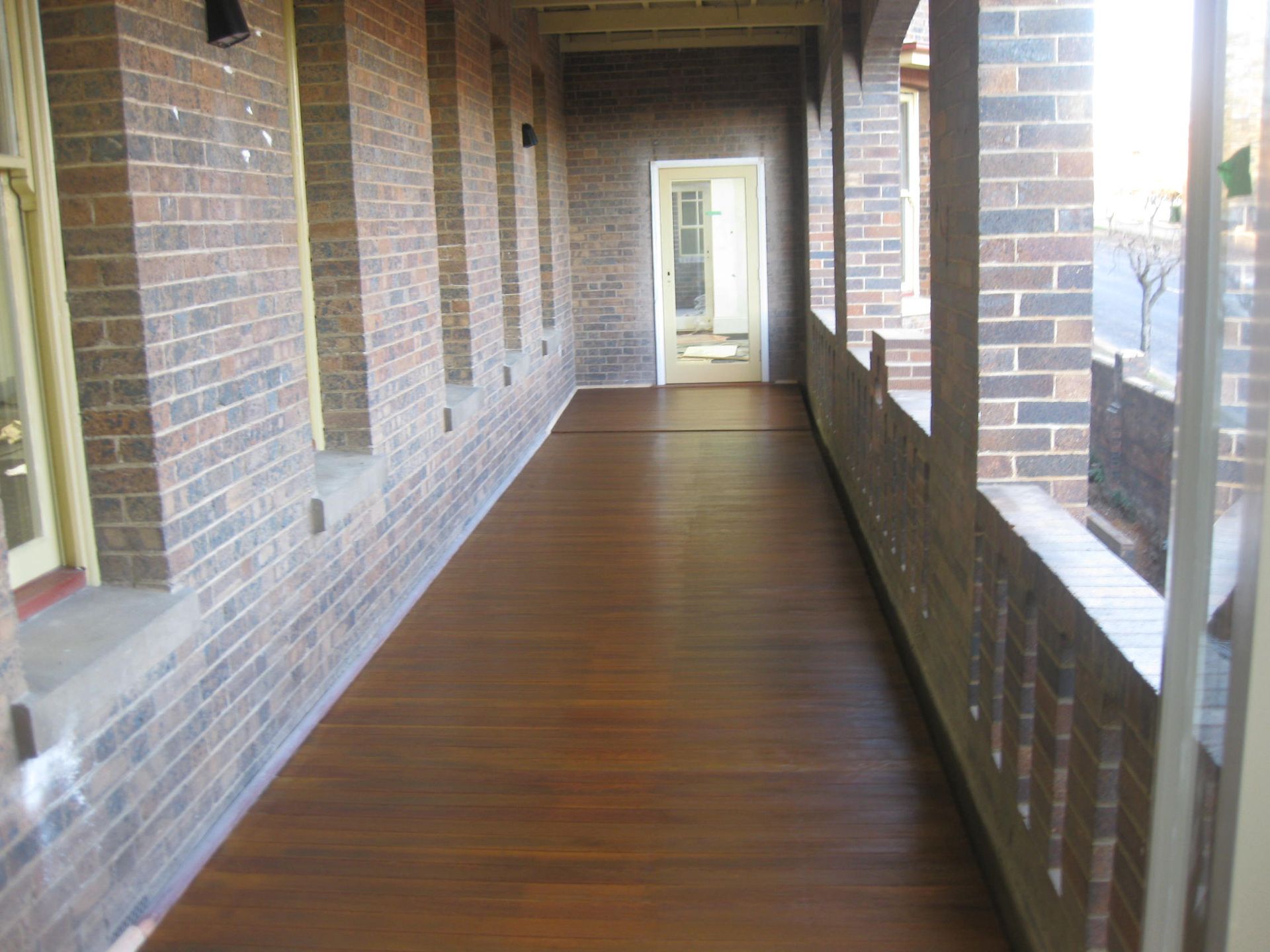 exterior corridor with timber floors at the Catholic Cathedral Precinct in Armidale