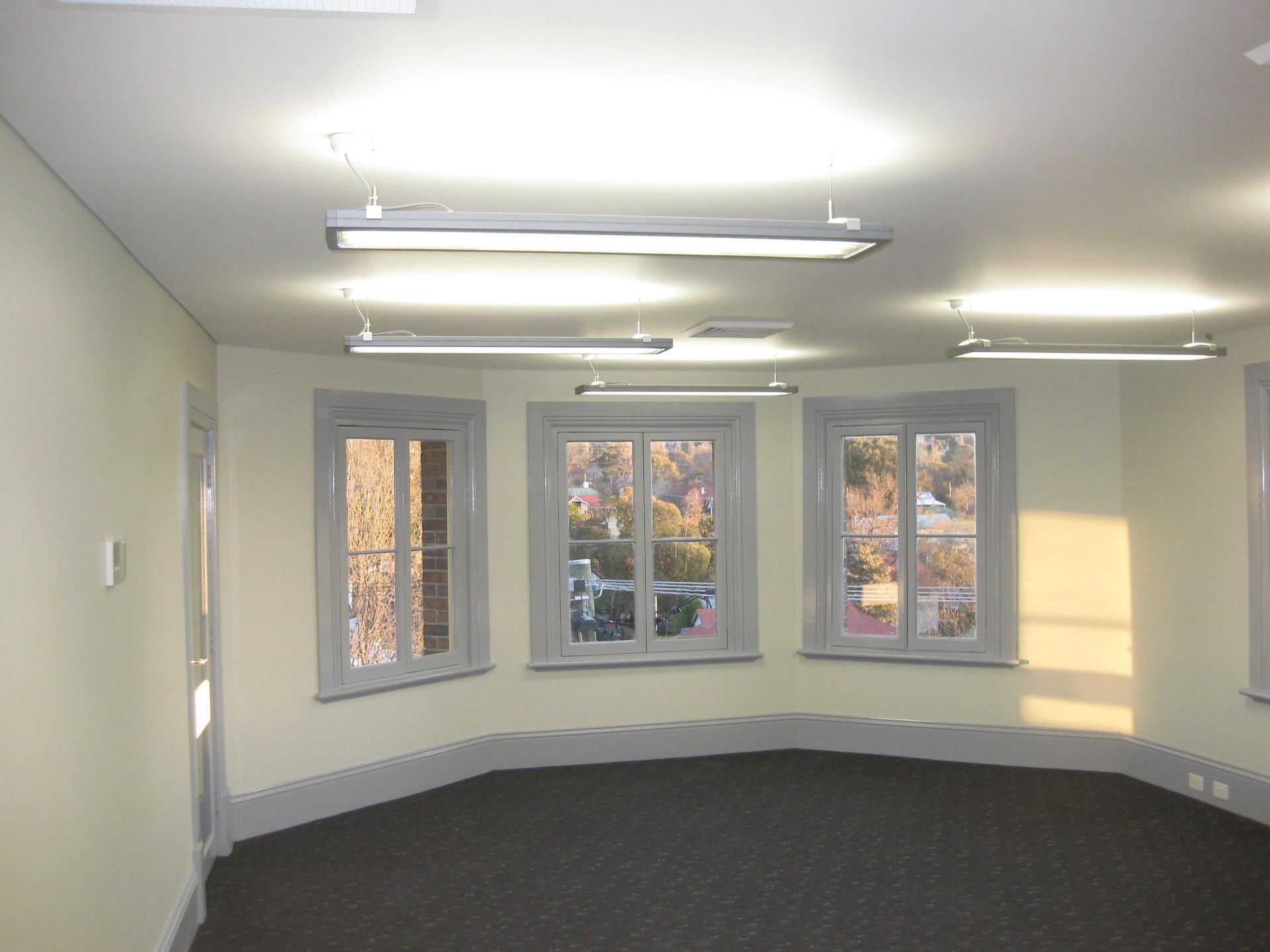 a room in the Catholic Cathedral Precinct in Armidale with fresh painted white walls 