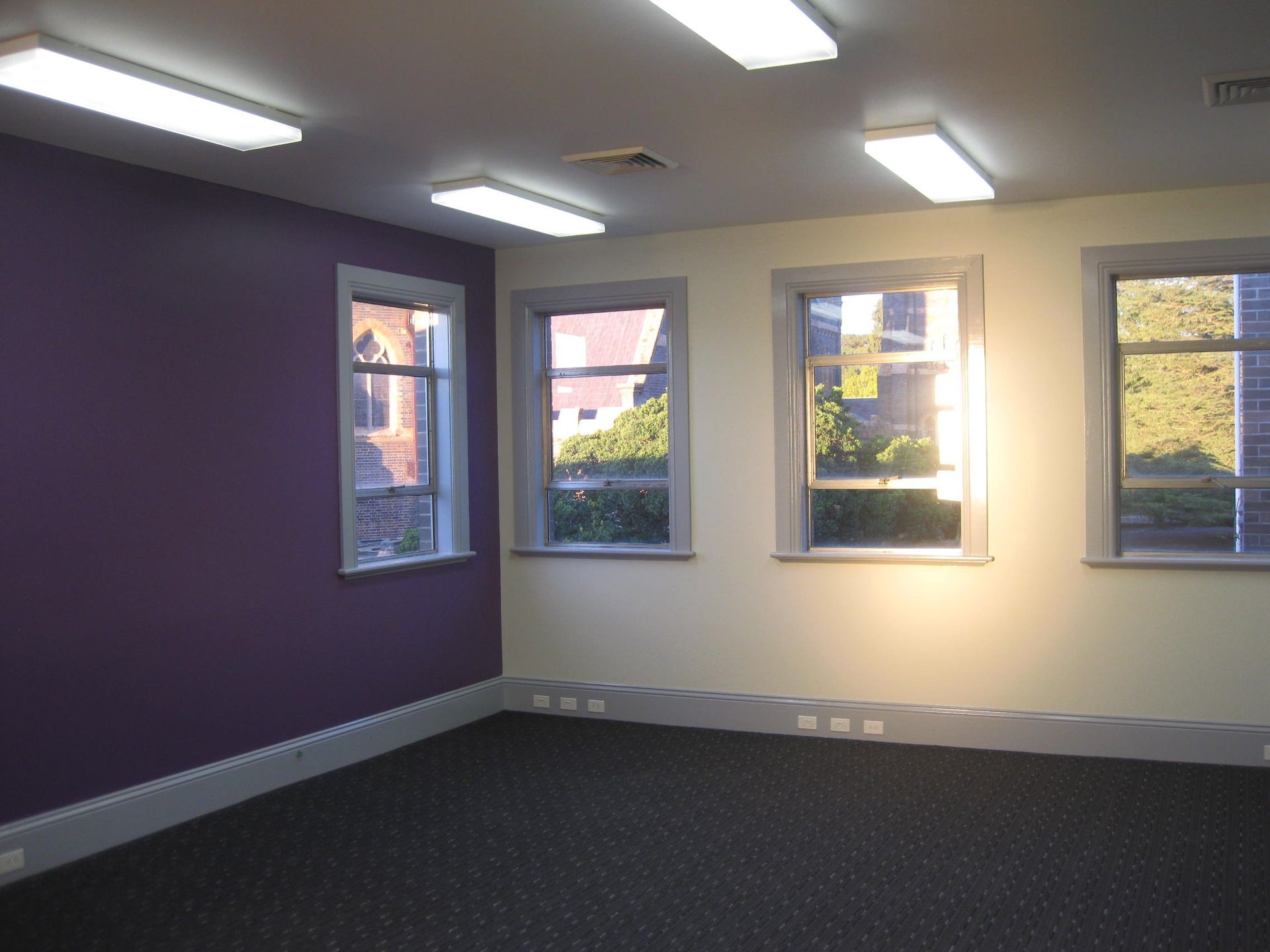 room with purple feature wall 
