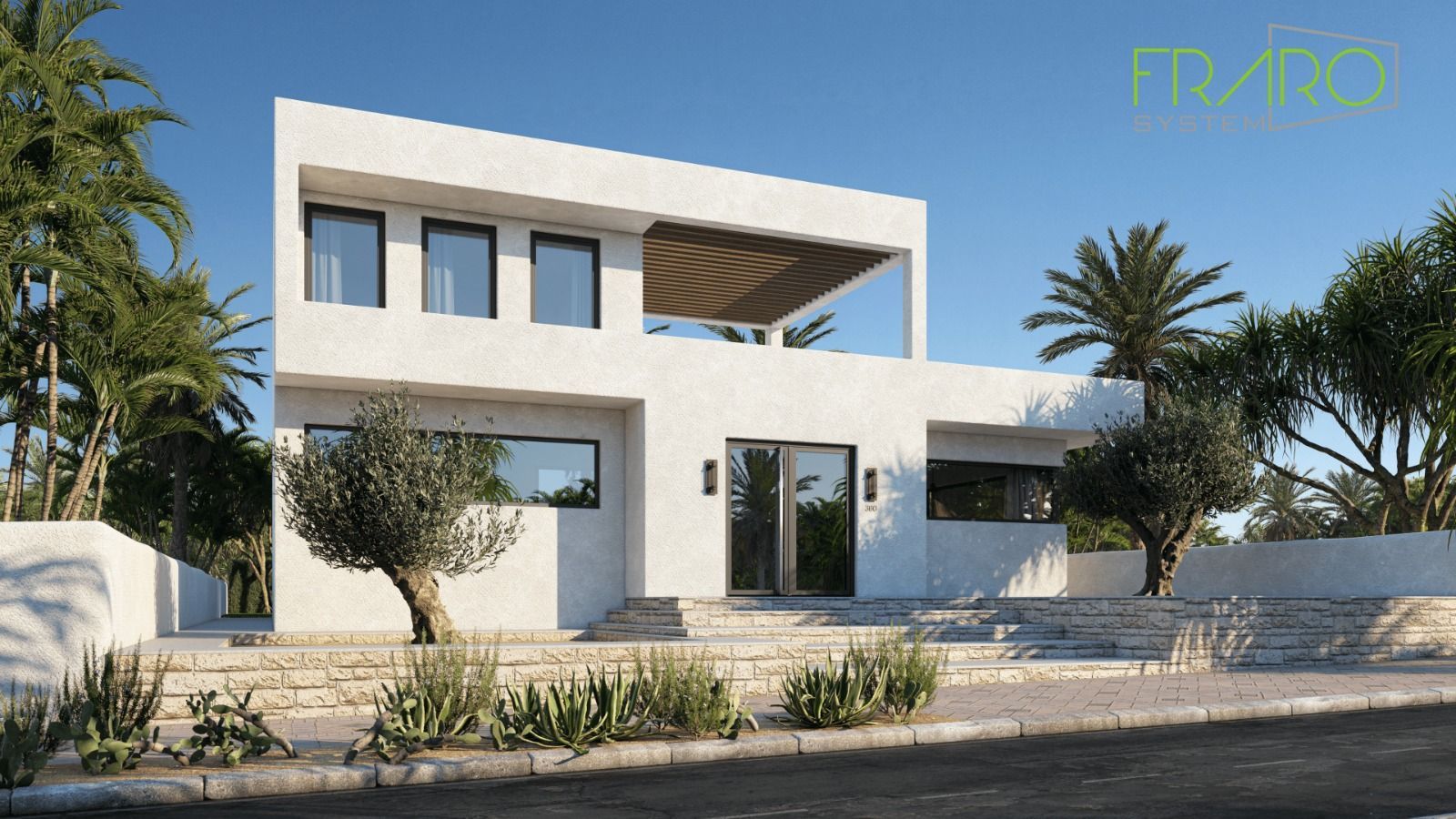 Una casa bianca con tante finestre è circondata da palme.