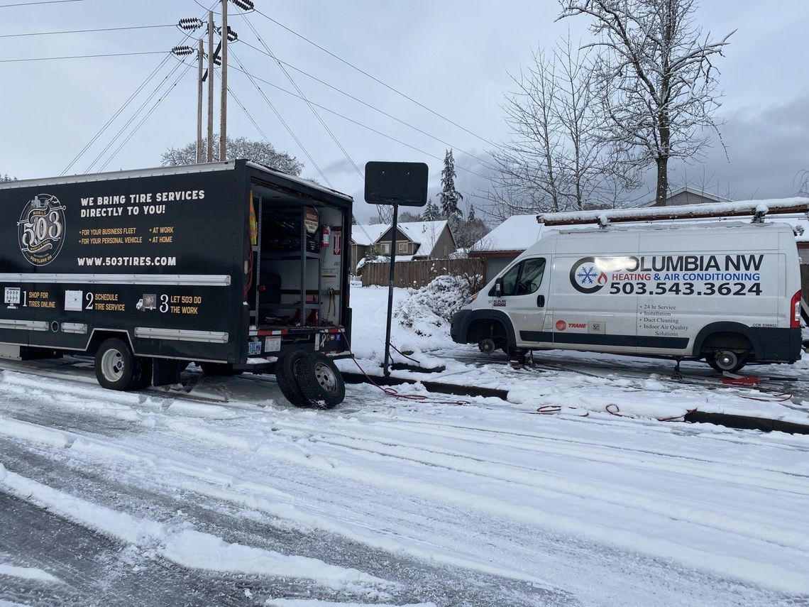 New Tires getting put on a work van.