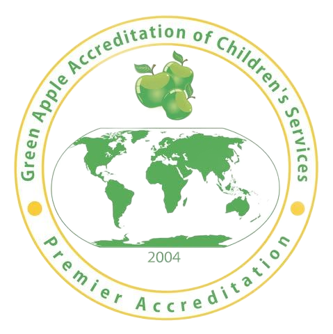 Green Apple Accreditation seal with green apples, world map, and text 