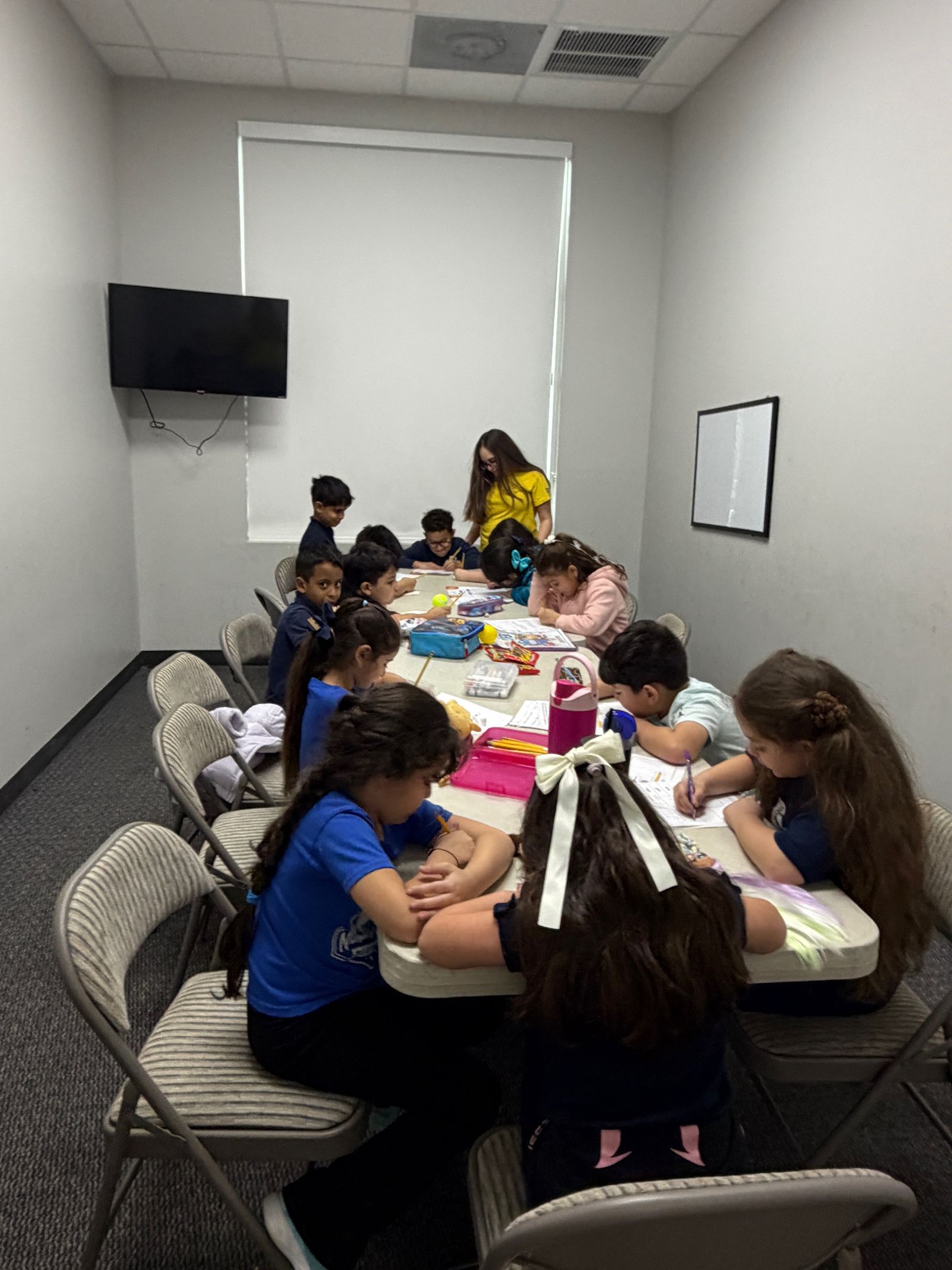 Red sandstone canyon walls, sculpted by water, with a glimpse of sunlight overhead.
