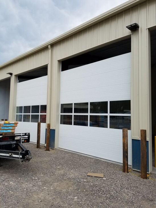 Wood Garage Doors — White Quality Garage Door in Montrose, CO