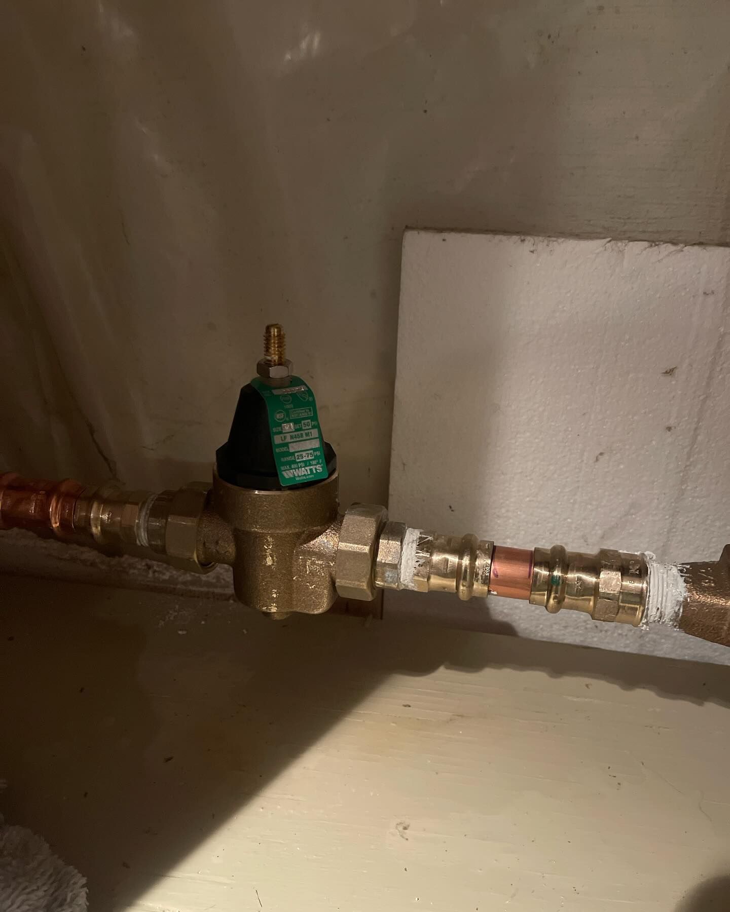 An aerial view of a large wave in the ocean.