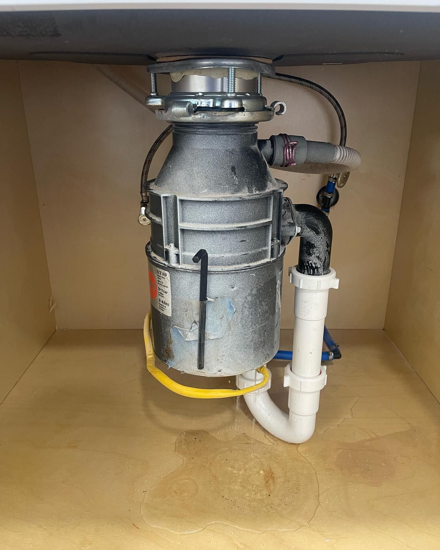 An aerial view of a large wave in the ocean.