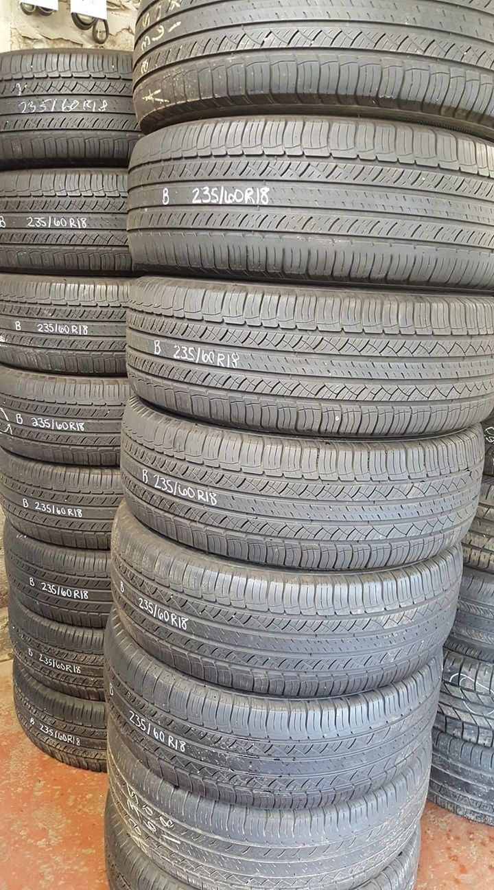 A pile of tires stacked on top of each other.