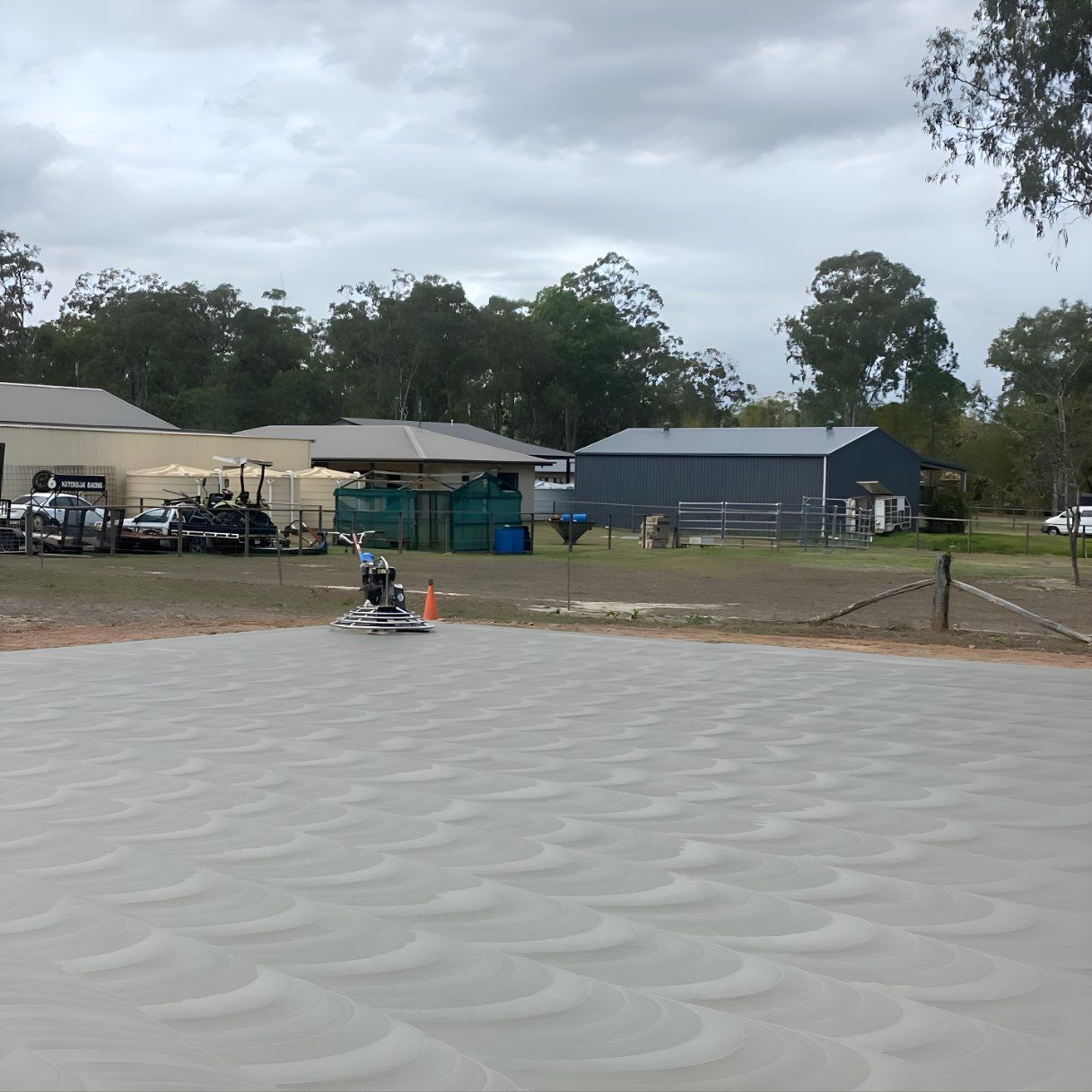A person is riding a jet ski on a concrete surface