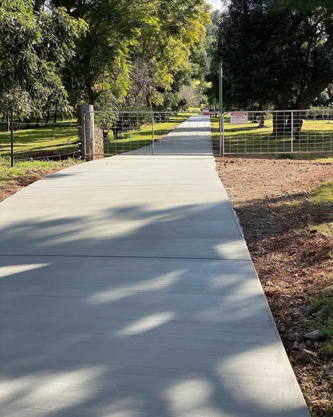 A Group Of Construction Workers Are Working On A Construction Site — Peter Bishop Concreting In Gympie, QLD