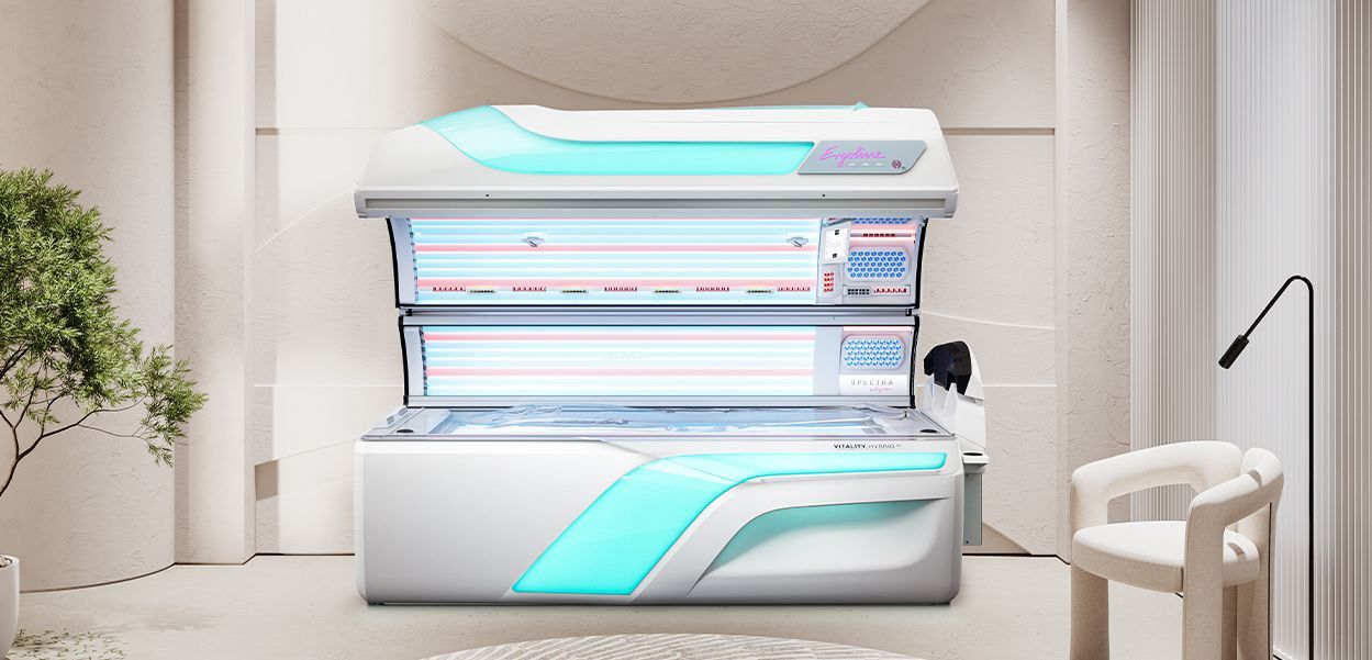 A group of tanning beds are stacked on top of each other.