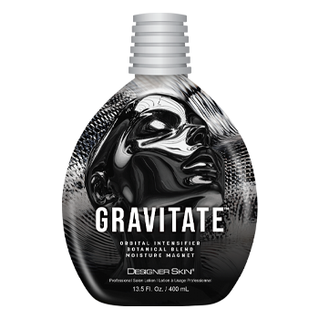 A bottle of Designer Skin Gravitate tanning lotion with a black and silver face design.
