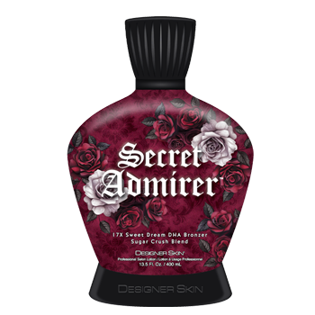 Dark red tanning lotion bottle with roses and
