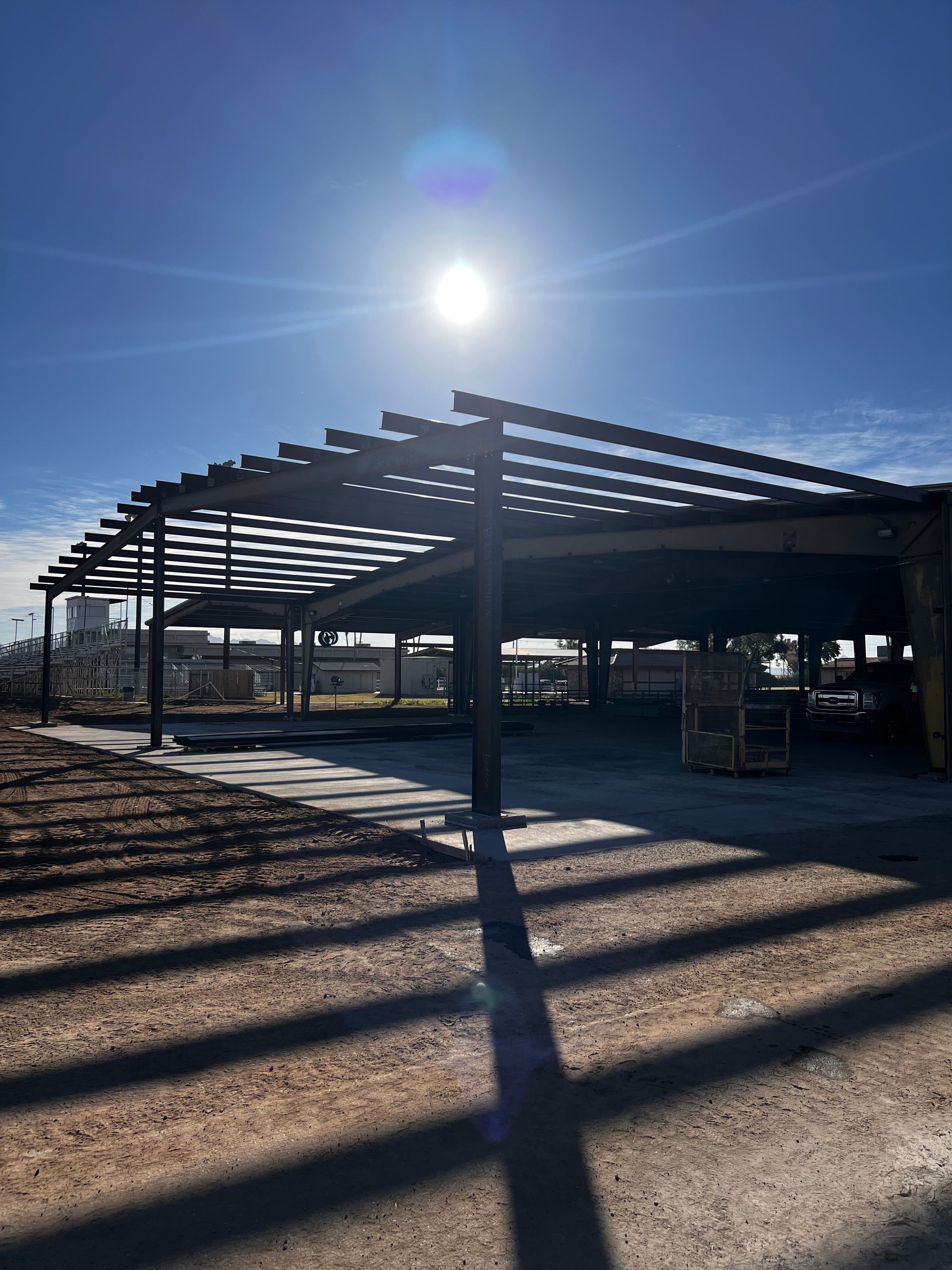 A house with a lot of windows and a tree in front of it.