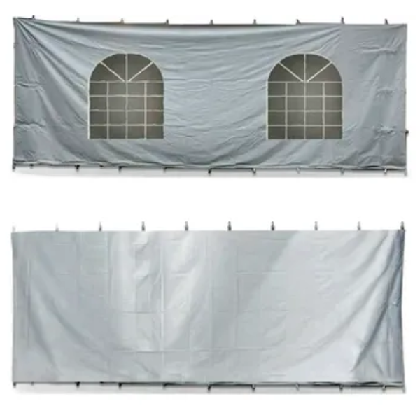 A white tarp with two windows on it