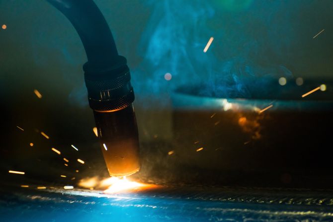 close up of metal welding torch