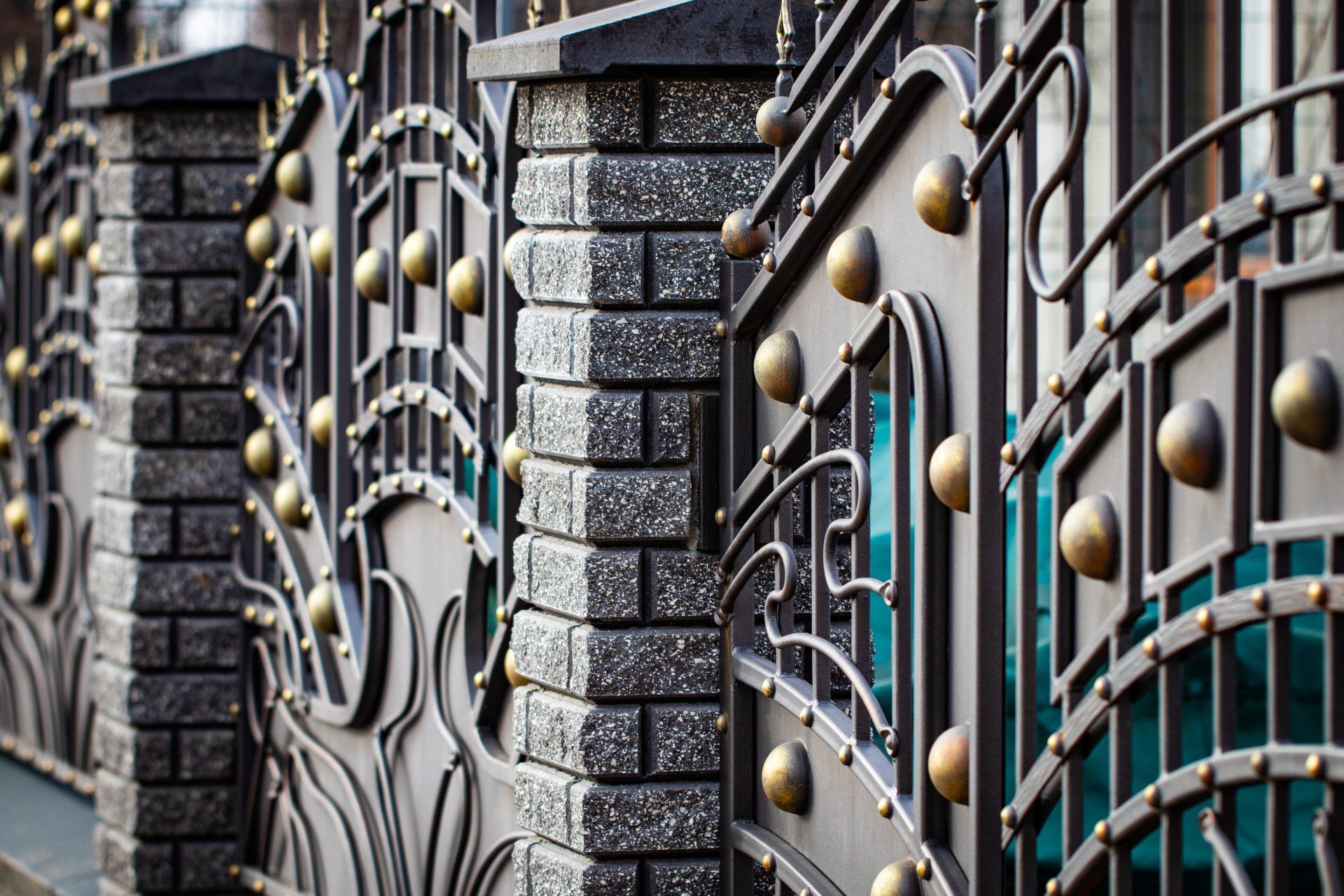 Decorative metal fence made out of thick wrought iron