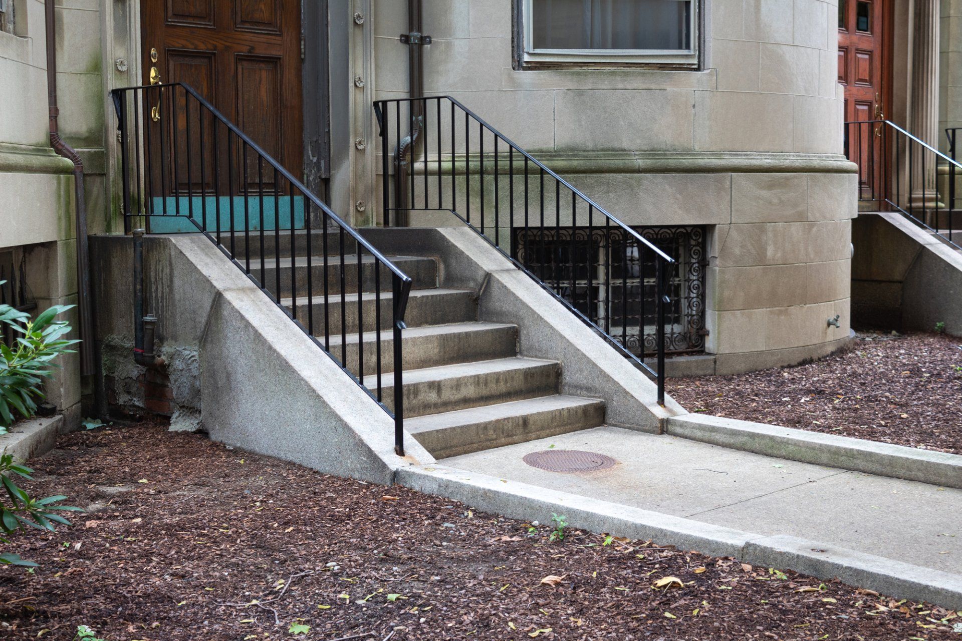 metal handrails for front stairs of city apartment building
