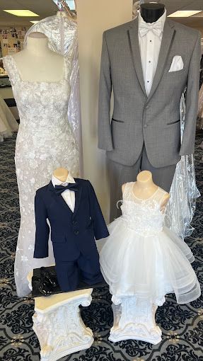 A group of mannequins are standing next to each other in a room.