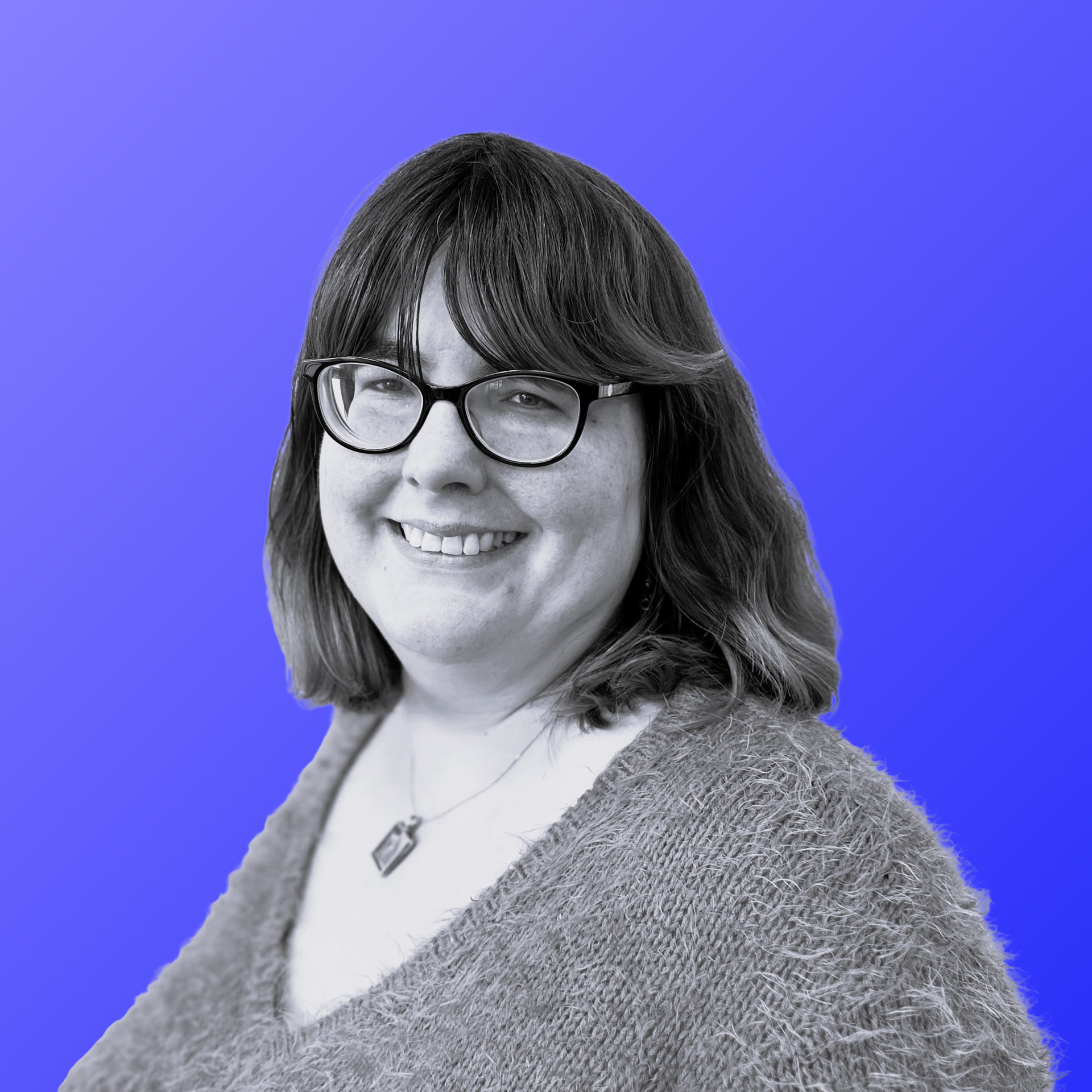 A black and white photo of a woman against a blue background.