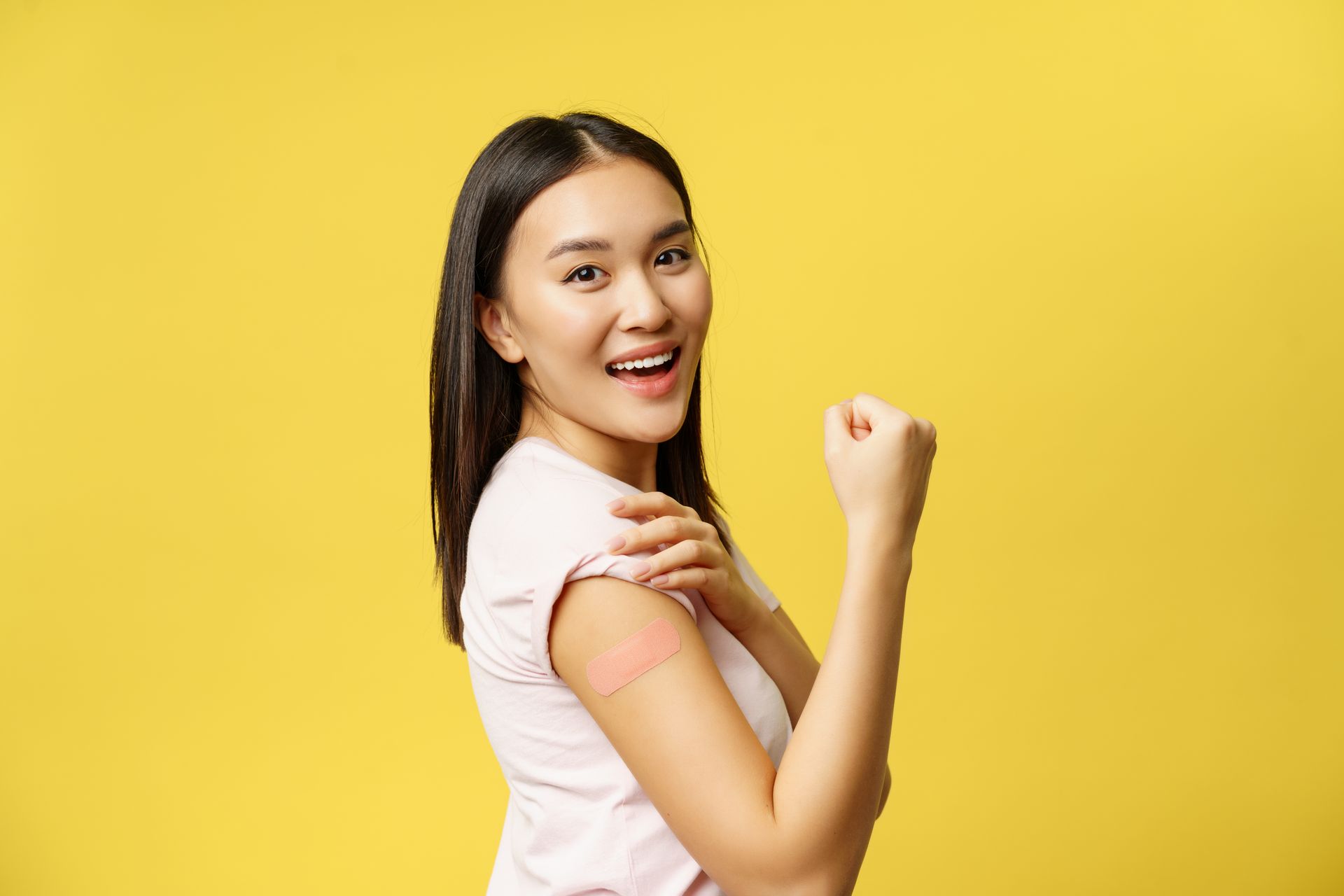 A woman celebrates after completing all phases of immunotherapy for allergies.