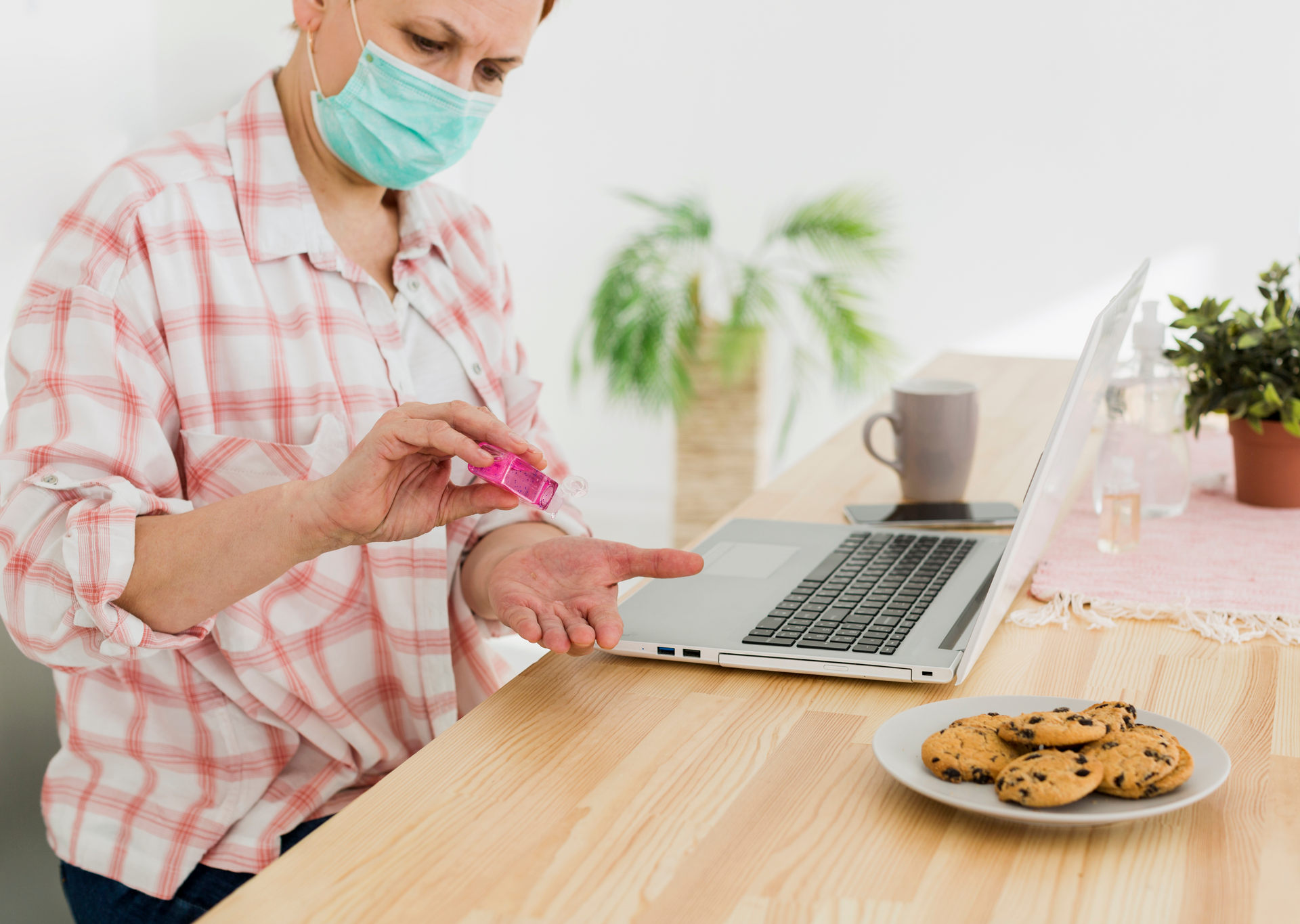 A woman holding her medication bottle to take her allergy medicine