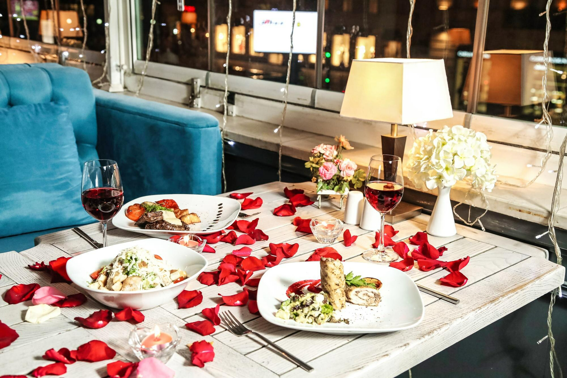 A table at a restaurant is carefully set, ensuring a safe dinner date for a customer with food allergies on Valentine’s Day. 