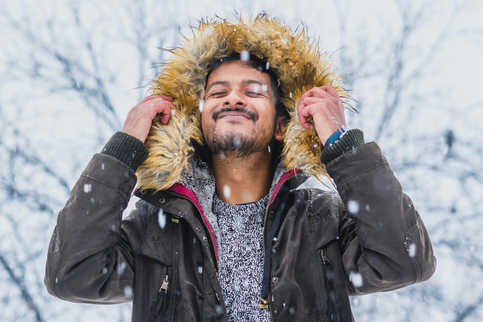 After discovering the best ways to prevent winter allergy flare-ups, the man can now confidently walk outdoors.