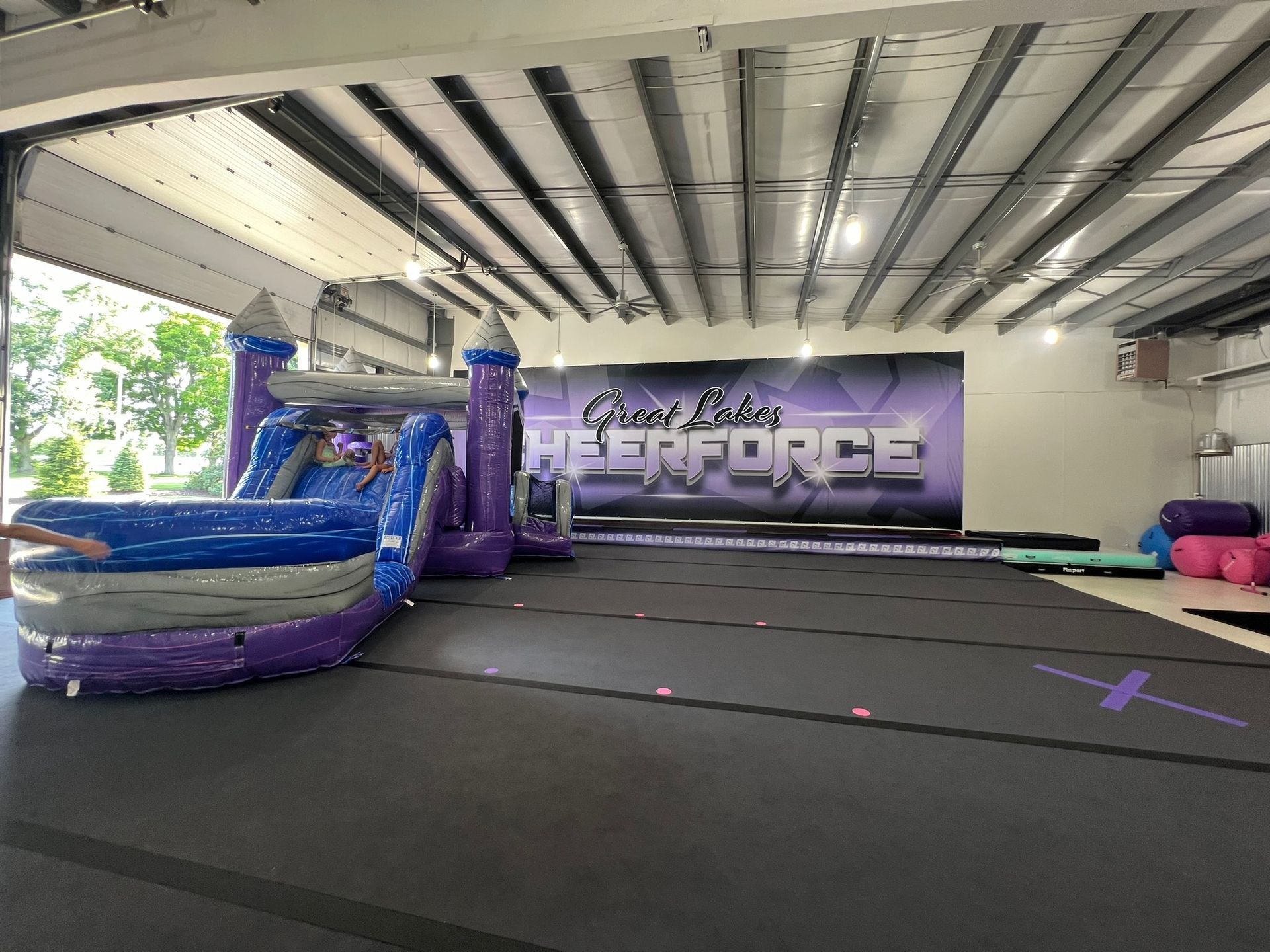 There is a bouncy house in the middle of the room.