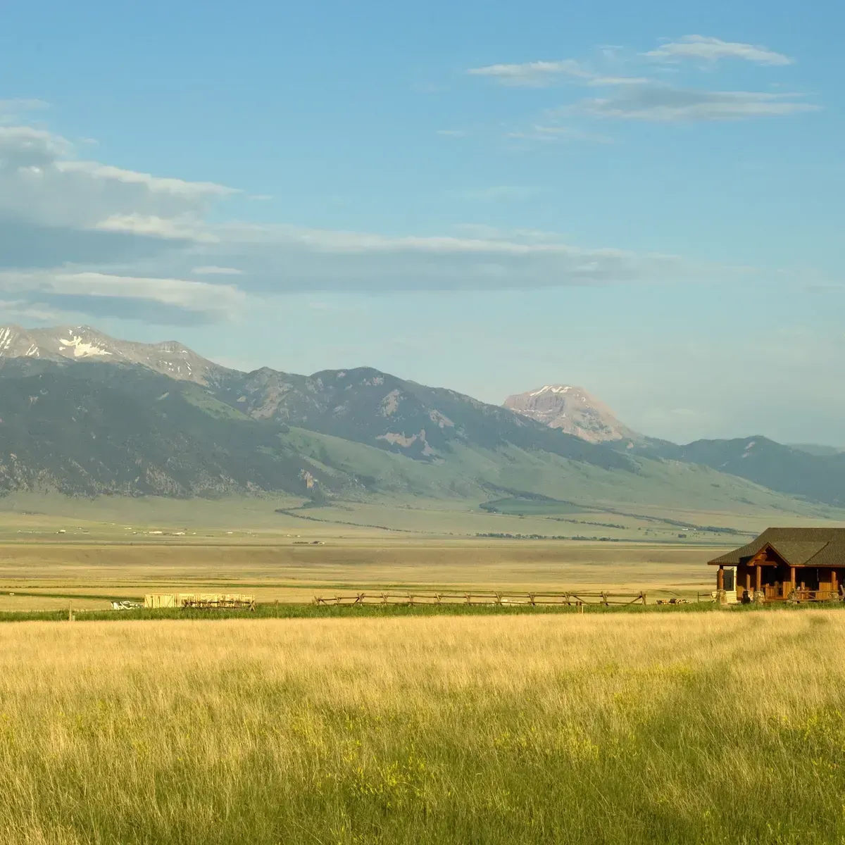 Lodge in a Field With Mountains in the Background — AT My Place Counselling and Psychotherapy in Neutral Bay, NSW